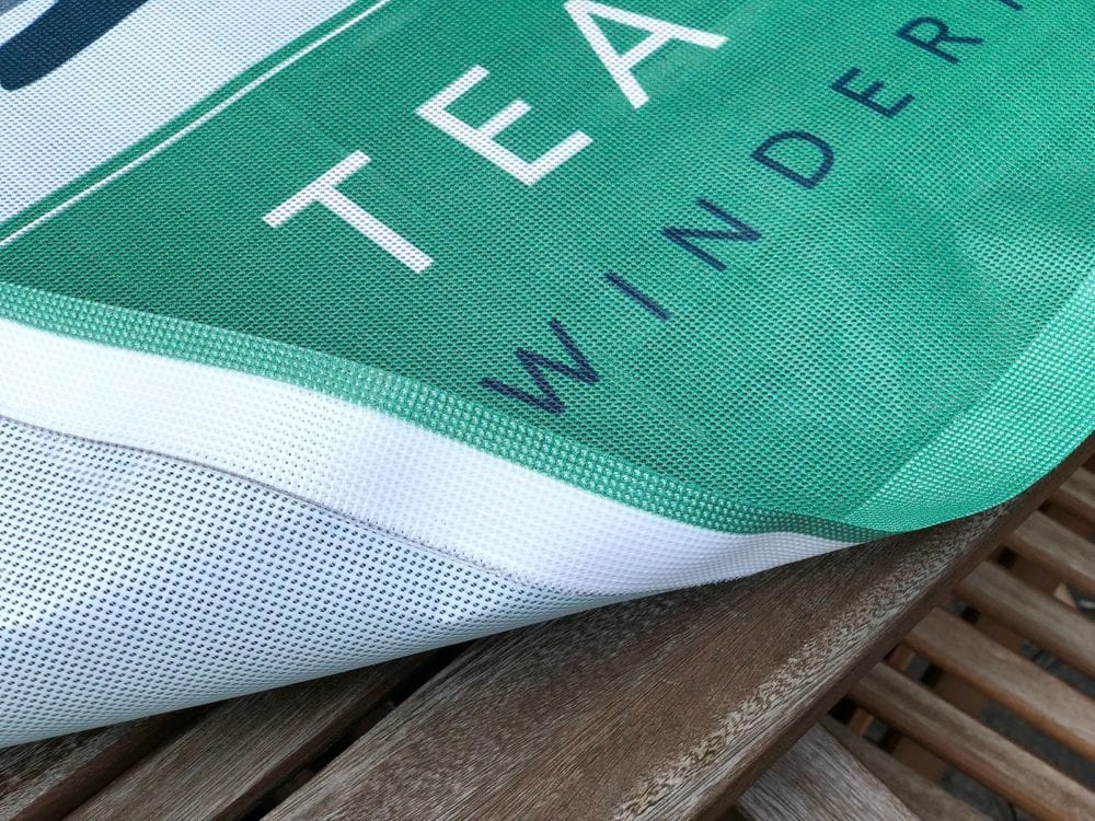 Printed mesh banner for outdoor seating area